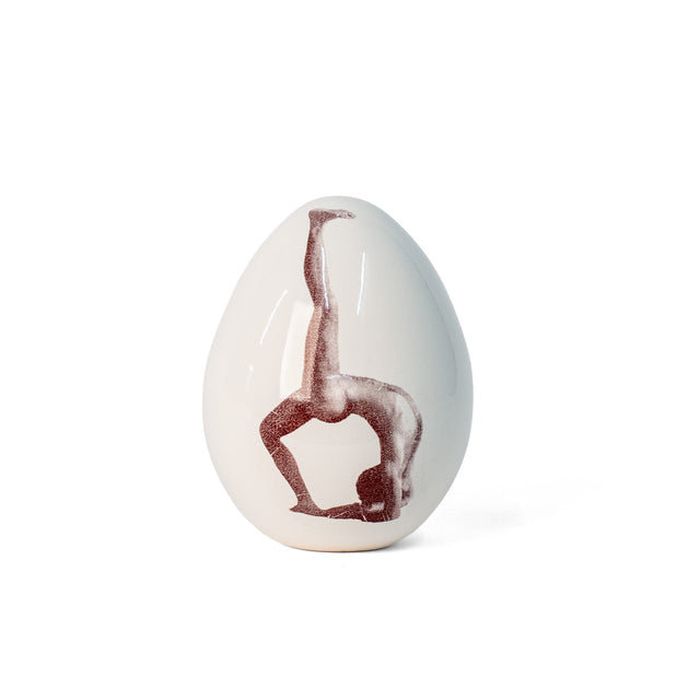 Figure Study Egg, porcelain with photographic figure-study imagery, by Jim Schatz
