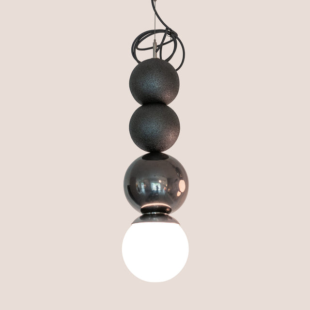 Graphite and Metallic Black ceramic Dot Dot Dot pendant, J Schatz.