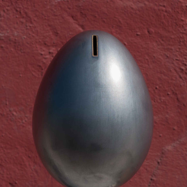 Metallic black ceramic egg bank, J Schatz