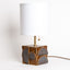 Geometria ceramic table lamp in cocoa blue metallic, side view, J Schatz