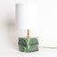Geometria ceramic table lamp in sage green metallic, J Schatz