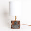 Geometria ceramic table lamp in walnut black metallic, J Schatz