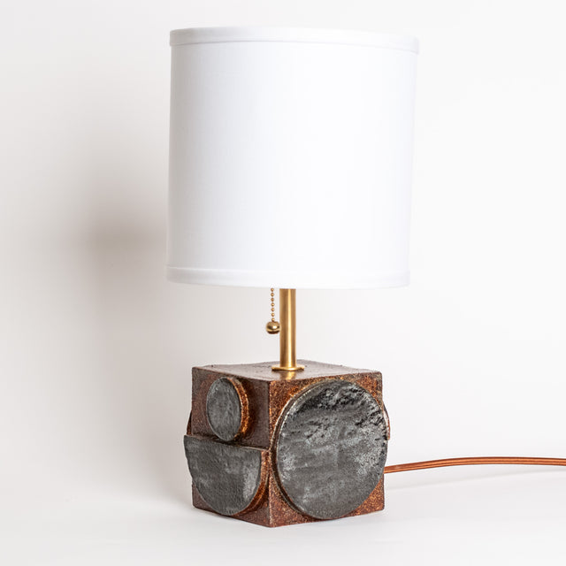 Geometria ceramic table lamp in walnut black metallic, side view, J Schatz