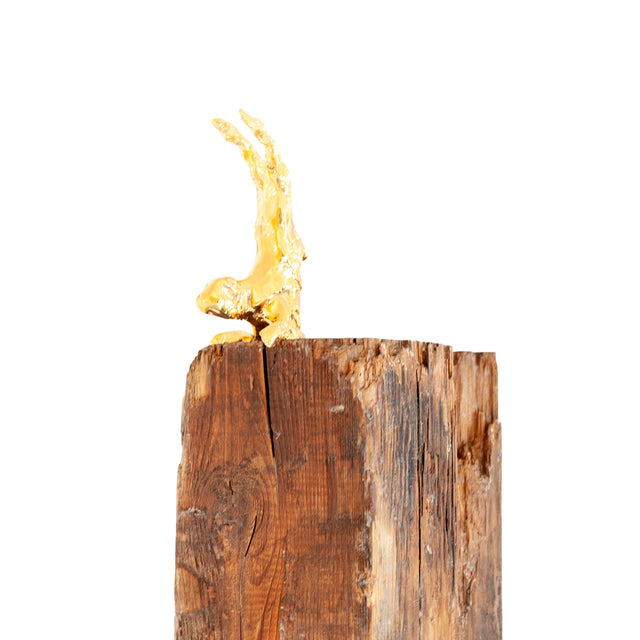 Handstand, gold lustre ceramic figure on a weathered wood base, sculpture by Jim Schatz