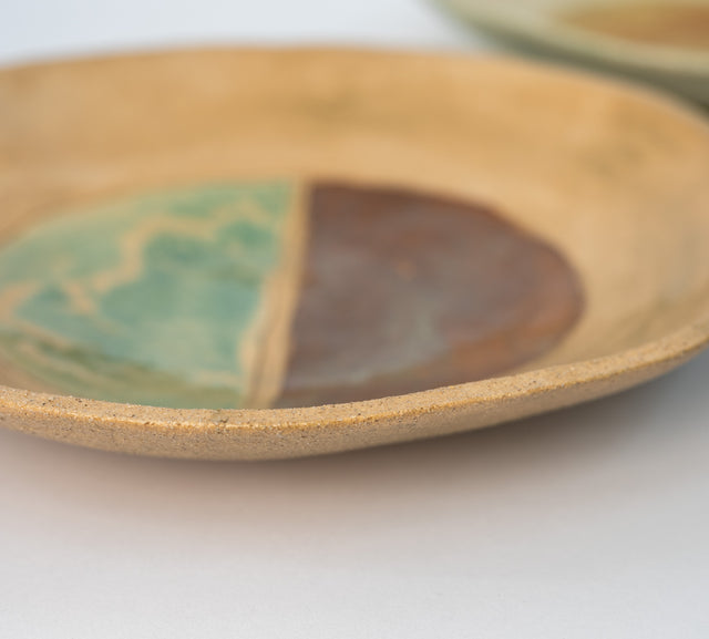 Geometria bowls in glazed stoneware, glaze 33/40 over 25 in front, J Schatz