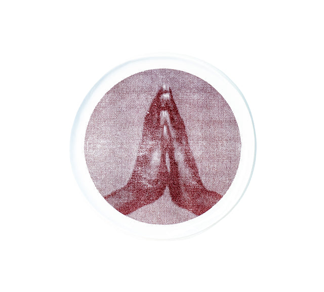 Photographic transfer of two palms pressed together on stoneware Gestures plate, J Schatz.