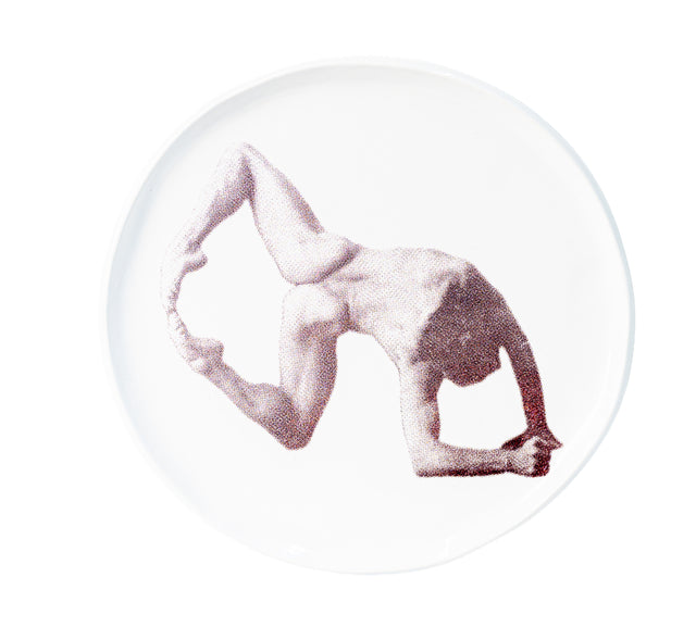 Photographic transfer of a standing backbend folded to the feet on stoneware Gestures plate, J Schatz.