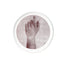 Photographic transfer of a raised forearm and curled hand on stoneware Gestures plate, J Schatz.