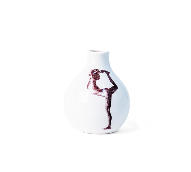 Photographic transfer of a standing backbend with leg raised behind on porcelain Gestures bud vase, J Schatz.