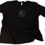 Take Me Home black t-shirt with white screen print, flat lay, J Schatz