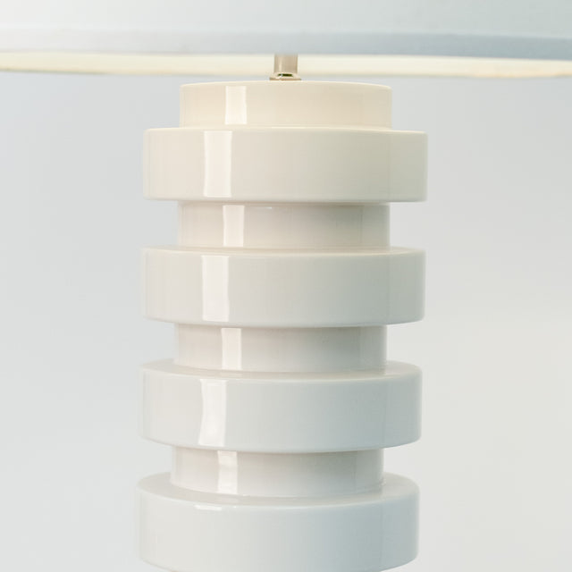 Bright white ceramic Wide Tooth floor lamp, J Schatz.