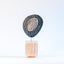 Zen sculpture, stoneware form on a carved wood base, by Jim Schatz and Peter Souza Jr.
