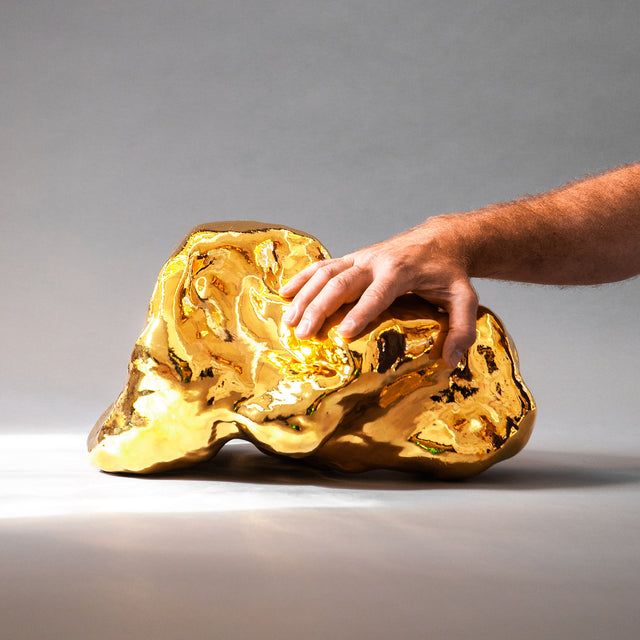 Gold Amorphous Sculpture, hand-sculpted stoneware in a lustrous gold overglaze, by Jim Schatz