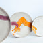 All Together Now hand-painted stoneware place setting, detail (Tyler, Sandy, Luke, Devon), by Jim Schatz