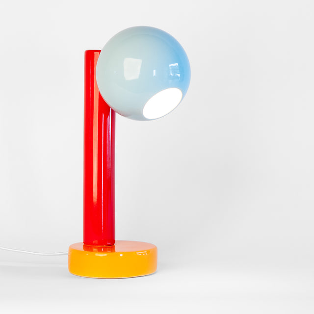 Spot On ceramic desk lamp in light aqua, sumac red, and orange peel, J Schatz
