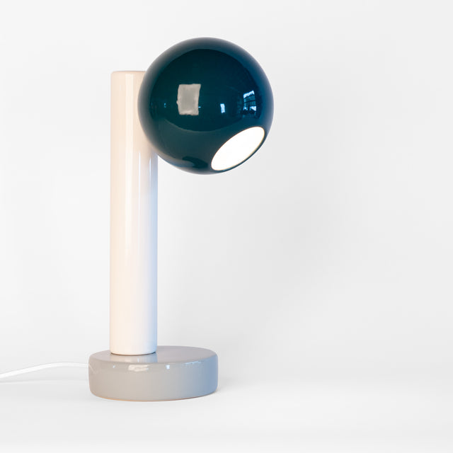 Spot On ceramic desk lamp in midnight blue, bright white, and slate grey, J Schatz