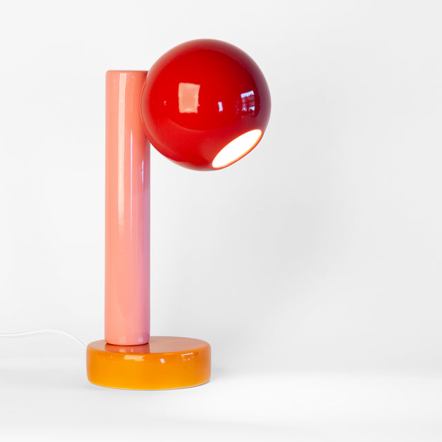 Spot On ceramic desk lamp in burnt red, pink, and ginger, J Schatz