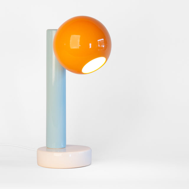 Spot On ceramic desk lamp in orange peel, light aqua, and bright white, J Schatz