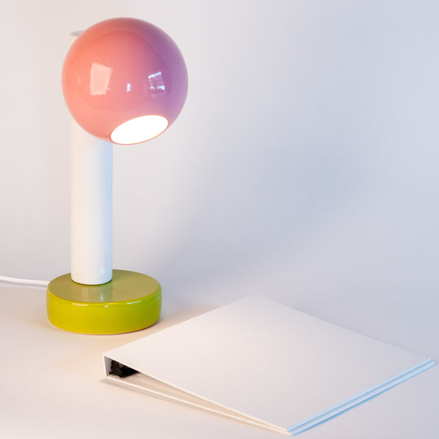 Spot On ceramic desk lamp in pink, bright white, and olive, side view, J Schatz