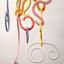 Doodle Mobile, detail of two-sided glazed stoneware extrusions, by Jim Schatz