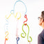 Doodle Mobile, hanging stoneware mobile of glazed extrusions, by Jim Schatz