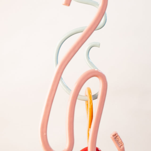 Doodle Mobile, detail of two-sided glazed stoneware extrusions, by Jim Schatz