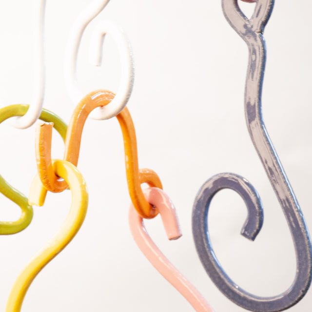 Doodle Mobile, detail of two-sided glazed stoneware extrusions, by Jim Schatz