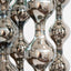 Happening Circle, suspended platinum stoneware sculpture on six steel cables, by Jim Schatz