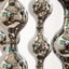 Happening Circle, platinum-glazed stoneware shapes arranged in a circle, by Jim Schatz