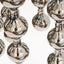 Happening Circle, detail of mirror-finished platinum stoneware shapes, by Jim Schatz
