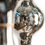 Happening Circle, detail of mirror-finished platinum stoneware shapes, by Jim Schatz