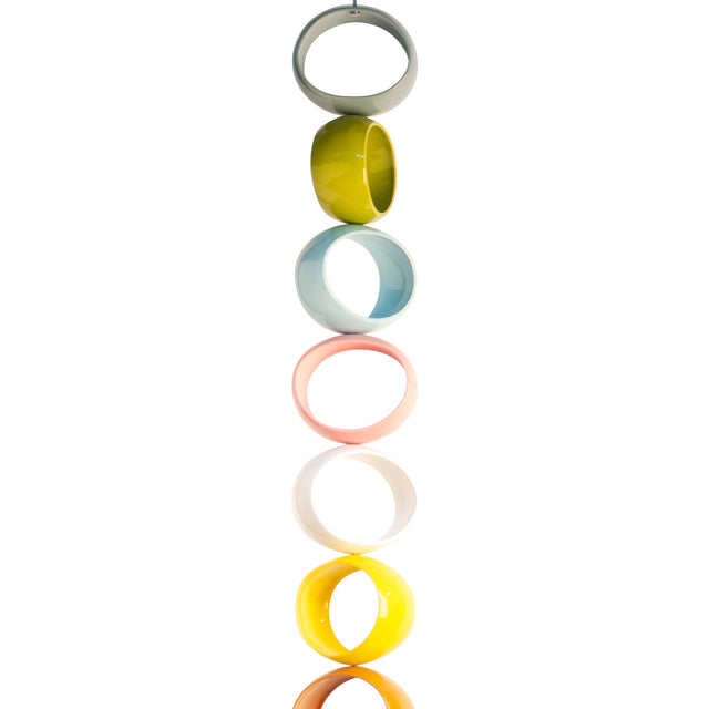 Multicolor Orb Sculpture, suspended stoneware orbs on a steel cable, by Jim Schatz