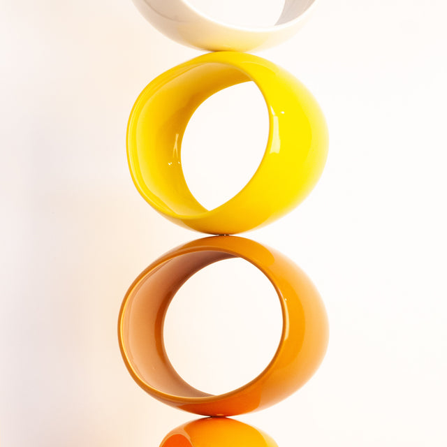 Multicolor Orb Sculpture, detail of glossy stoneware orbs, by Jim Schatz