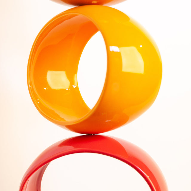Multicolor Orb Sculpture, detail of glossy stoneware orbs, by Jim Schatz