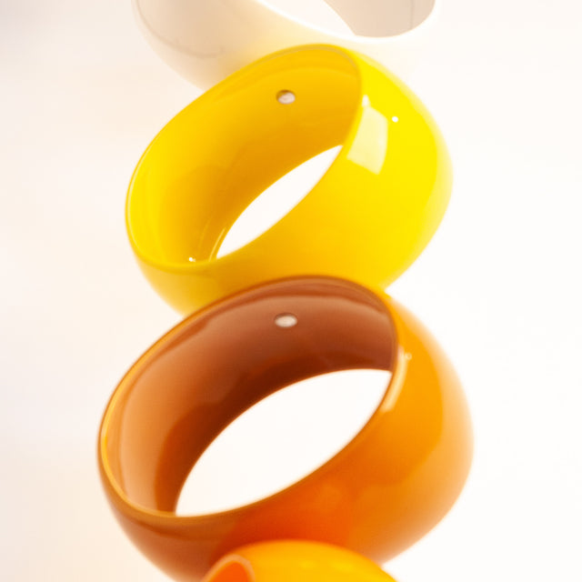 Multicolor Orb Sculpture, detail of glossy stoneware orbs, by Jim Schatz