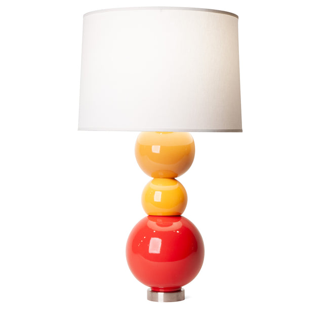According To ceramic table lamp in ginger, orange peel, and sumac red, J Schatz