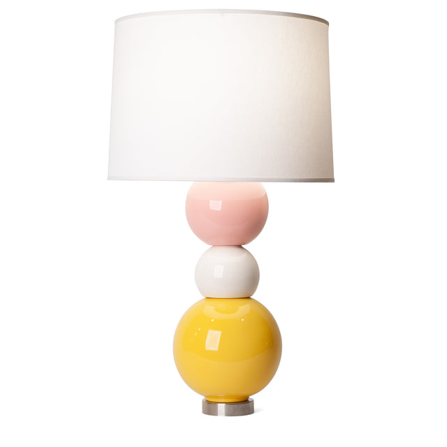 According To ceramic table lamp in pink, bright white, and goldenrod yellow, J Schatz