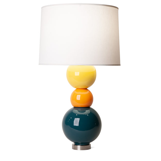 According To ceramic table lamp in goldenrod yellow, orange peel, and midnight blue, J Schatz