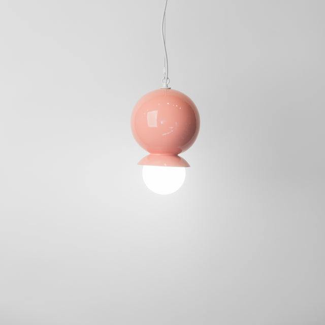 Pink ceramic Dot Dot Dot pendant, J Schatz.