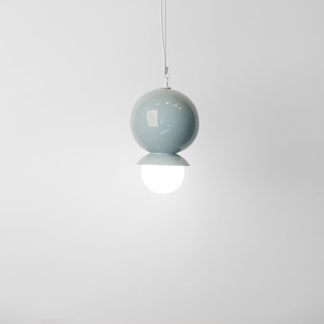 Slate grey ceramic Dot Dot Dot pendant, J Schatz.
