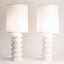 High-gloss white ceramic Wide Tooth table lamp pair, J Schatz.